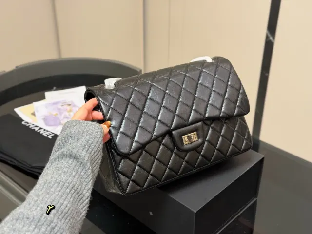 Chanel 2.55 Chain Handbag in Leather — 30 × 28 cm — source photograph 1 of 3