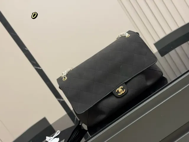 Chanel Classic Flap Handbag in Leather — 40 × 26 cm — source photograph 1 of 3