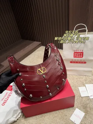 Valentino Studded Shoulder Bag in Leather — source photograph 1 of 3