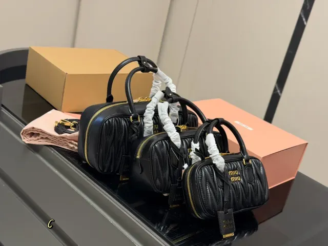 Miu Miu Crossbody Bag in Leather — 28 × 13 cm Options — source photograph 1 of 3