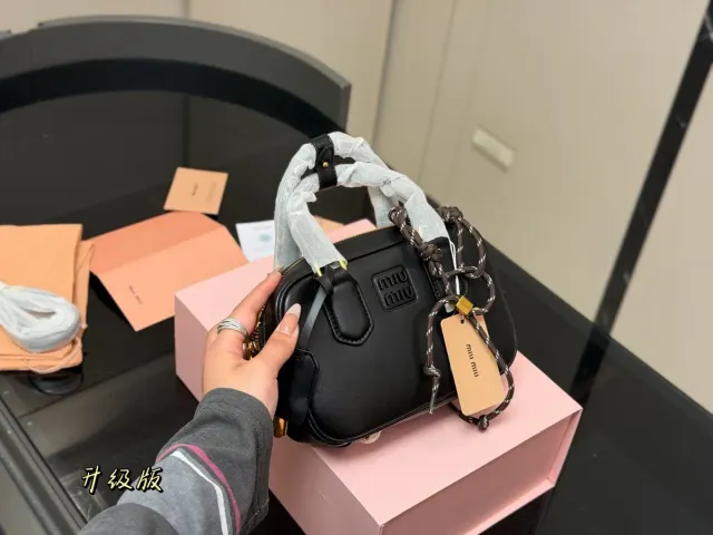Miu Miu Crossbody Bag in Leather — 20 × 13 cm — source photograph 1 of 3