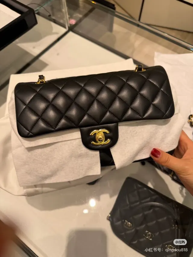 Chanel Classic Flap Shoulder Bag in Leather — source photograph 1 of 3