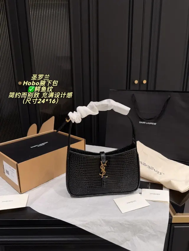 Saint Laurent Croc Embossed Shoulder Bag in Leather — source photograph 1 of 3