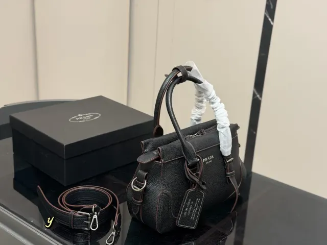 Prada Canvas Handbag — 31 × 20 cm — source photograph 1 of 3