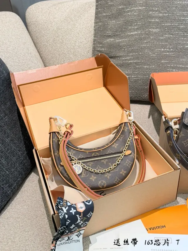 Louis Vuitton Loop Monogram Chain Crossbody Bag in Leather — source photograph 1 of 3