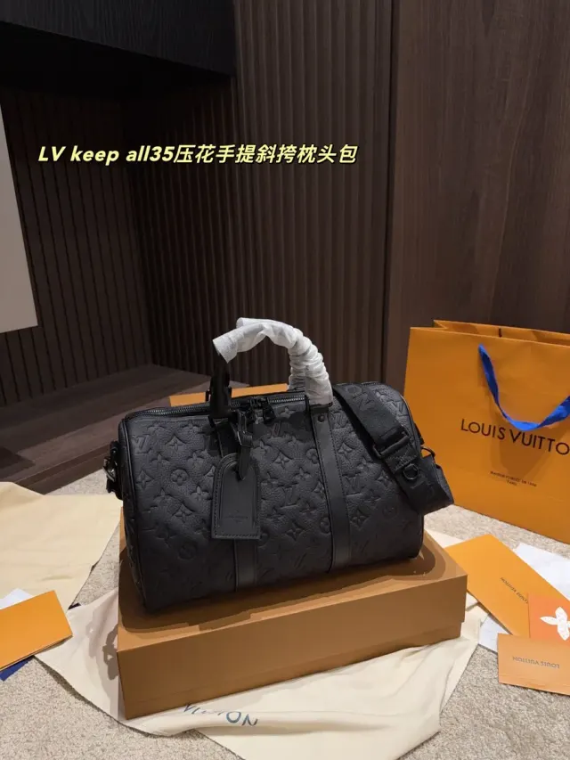 Louis Vuitton Keepall 35 Crossbody Bag in Cowhide Leather — source photograph 1 of 3