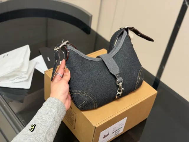 Coach Crossbody Bag in Leather — 26 × 19 cm — source photograph 1 of 3