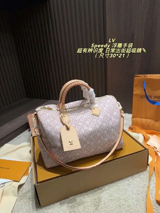 Louis Vuitton Speedy Woven Canvas Satchel Bag — source photograph 1 of 3