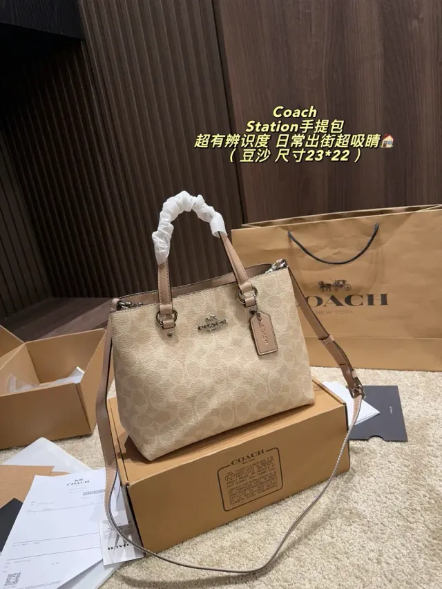 Coach Monogram Canvas Top-Handle Bag — source photograph 1 of 3