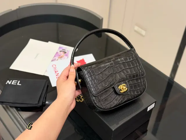 Chanel 2.55 Handbag in Leather — 20 × 15 cm — source photograph 1 of 3