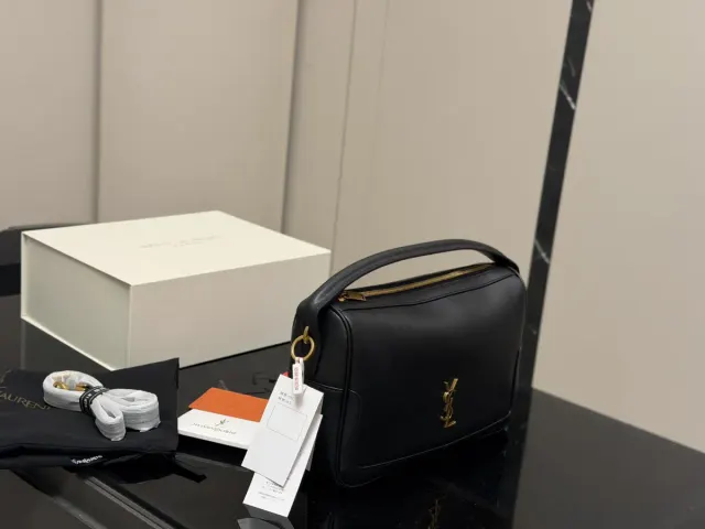 Saint Laurent Crossbody Bag in Leather — 29 × 18 cm — source photograph 1 of 3
