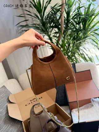 Coach Lana Bucket Bag in Cowhide Leather — 22.5 × 31.5 × 13.5 cm — source photograph 1 of 3