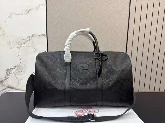 Coach Travel Bag in Leather — 50 × 27 cm — source photograph 1 of 3