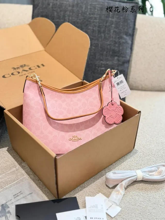 Coach Monogram Canvas Crossbody Bag — 31 × 23.5 × 10.5 cm — source photograph 1 of 3