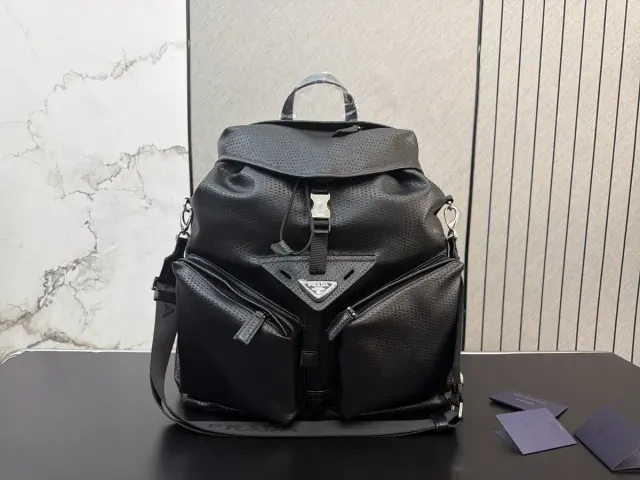 Prada Re-Nylon Drawstring Backpack — 38 × 42 cm — source photograph 1 of 3