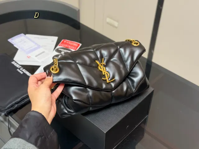 Saint Laurent Loulou Puffer Quilted Handbag in Leather — 26 cm — source photograph 1 of 3