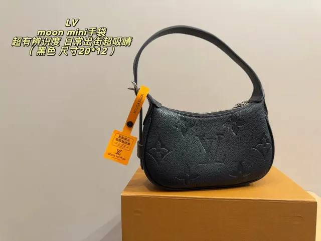 Louis Vuitton Minimoon Crossbody Bag in Leather — source photograph 1 of 3
