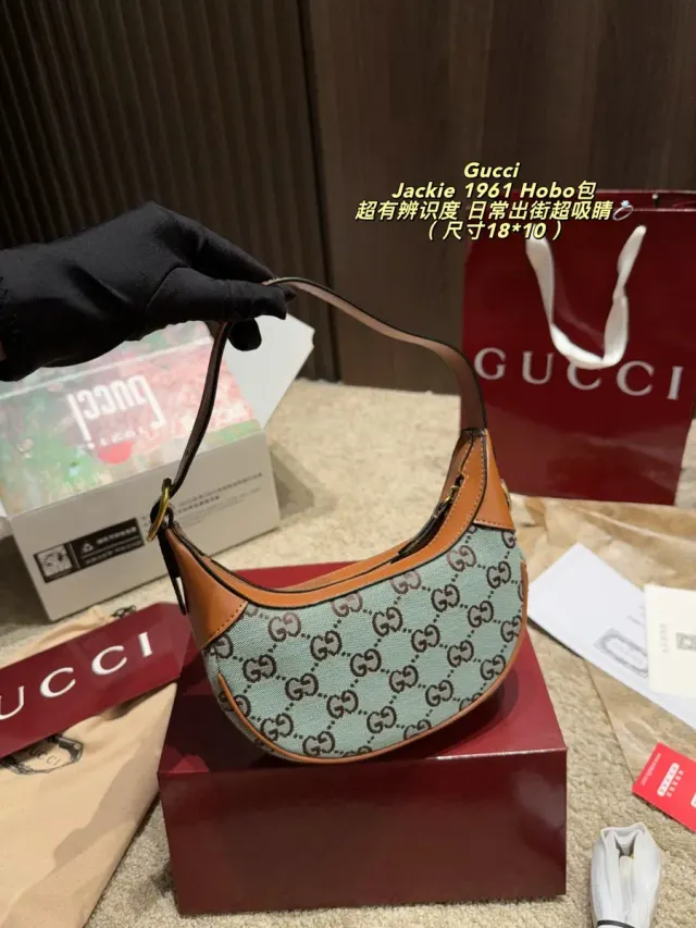 Gucci Jackie GG Canvas Crossbody Bag — source photograph 1 of 3