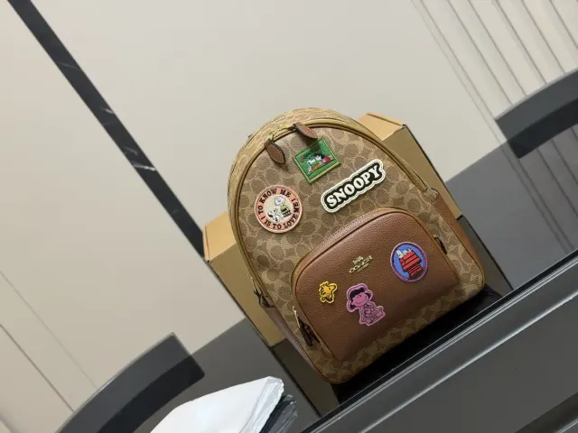 Coach Canvas Backpack — 27 × 33 cm — source photograph 1 of 3