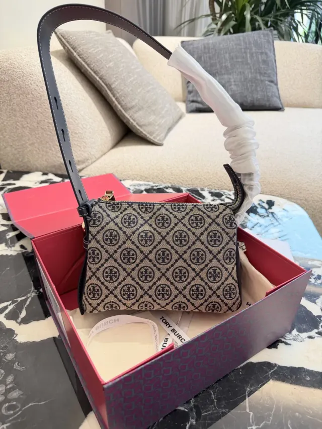 Tory Burch Romy Monogram Shoulder Bag in Leather — 25 cm — source photograph 1 of 3