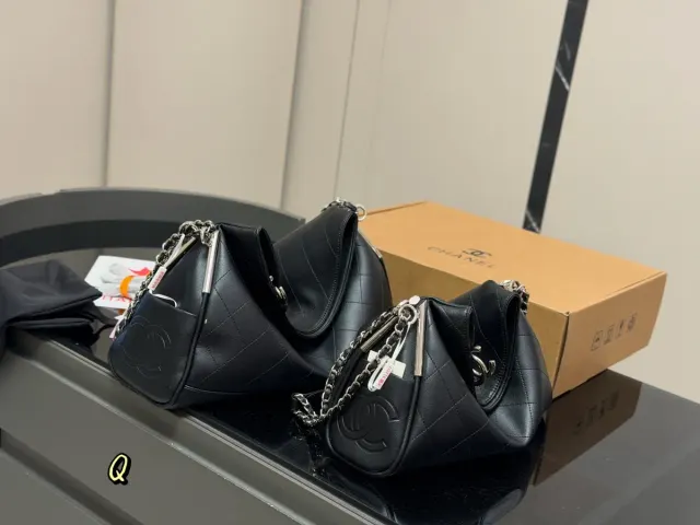 Chanel Quilted Shoulder Bag in Leather — 30 × 21 cm Options — source photograph 1 of 3