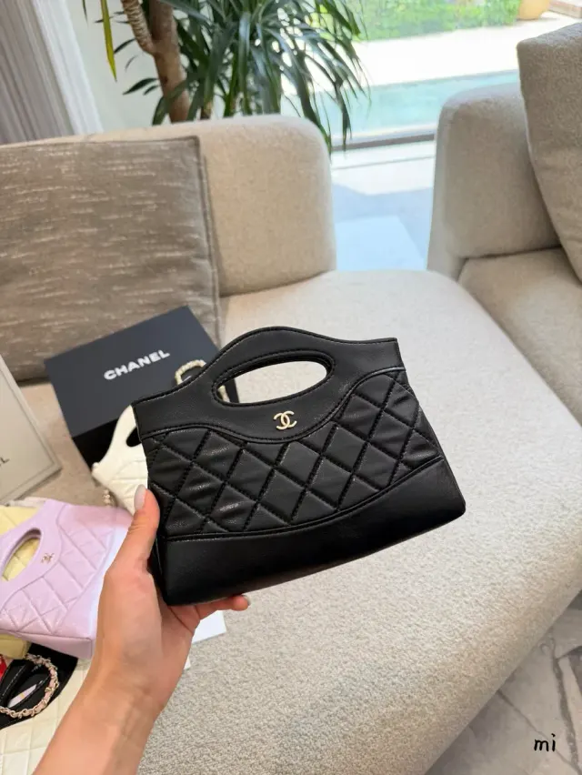Chanel 31 Quilted Top-Handle Bag in Leather — 20 × 17.5 × 3.5 cm — source photograph 1 of 3
