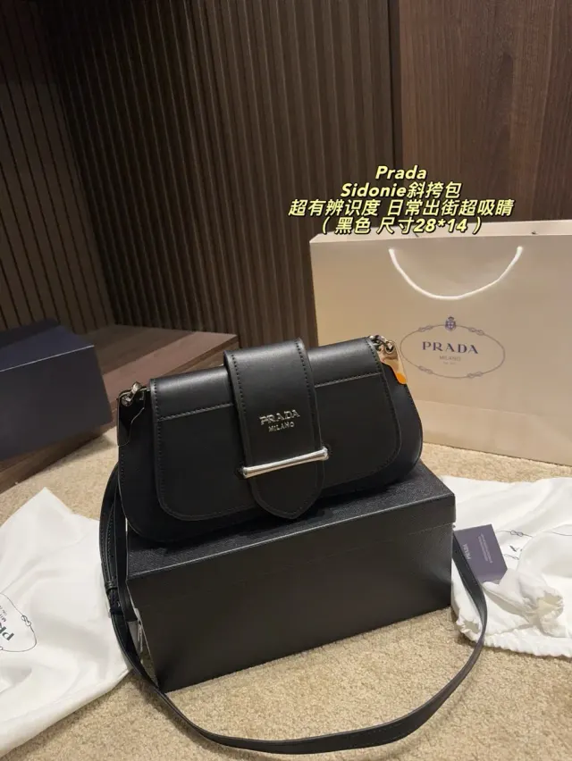 Prada Chain Flap Crossbody Bag in Leather — source photograph 1 of 3