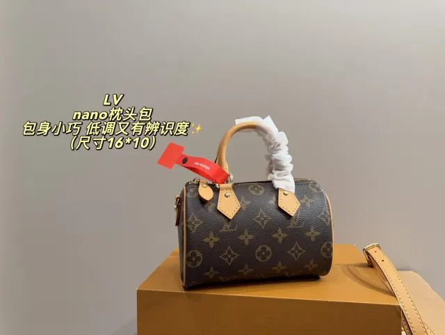 Louis Vuitton Nano Satchel Bag in Leather — source photograph 1 of 3