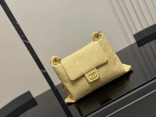 Chanel Denim Woven Messenger Bag — 38 × 24 cm — source photograph 1 of 3
