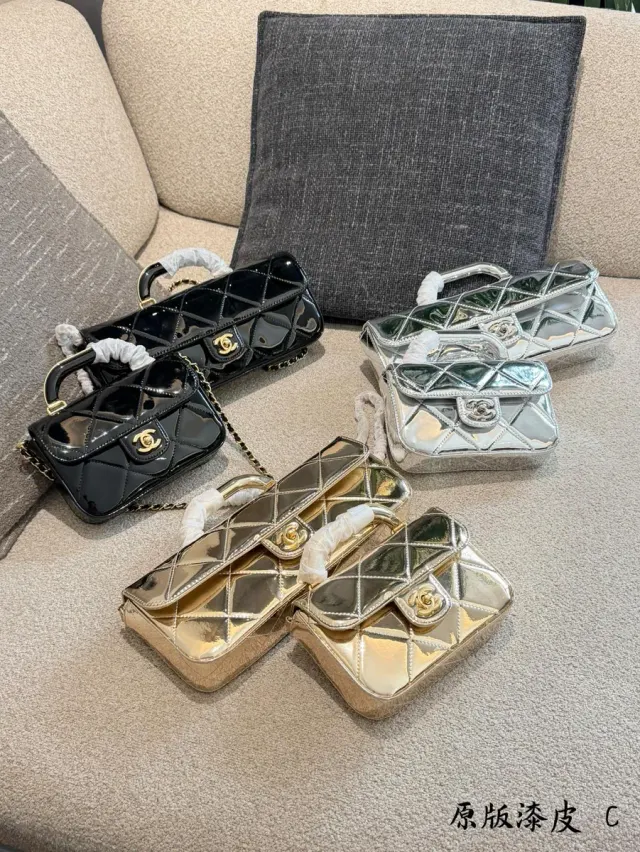 Chanel Quilted Top-Handle Bag in Leather — 18 cm Options — source photograph 1 of 3