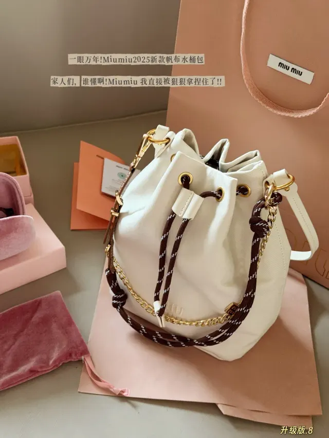 Miu Miu Canvas Bucket Bag — 17 × 21 cm — source photograph 1 of 3