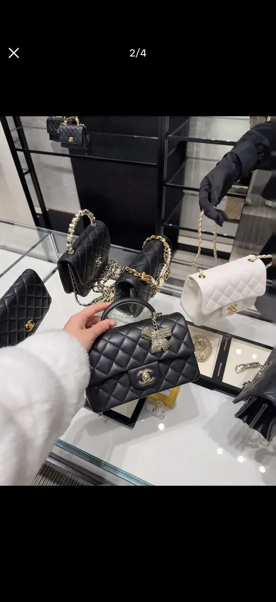 Chanel Classic Flap Bow Mini Bag in Leather — source photograph 1 of 3