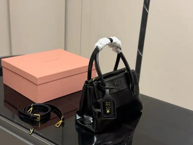 Miu Miu Flap Crossbody Bag in Leather — 28 × 18 cm — source photograph 1 of 3