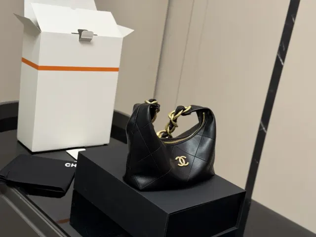 Chanel Quilted Shoulder Bag in Leather — 25 × 23 cm — source photograph 1 of 3