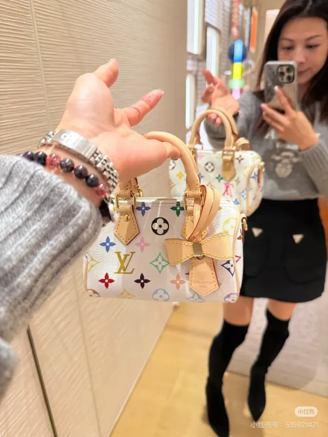 Louis Vuitton All In Bow Handbag in Leather — source photograph 1 of 3
