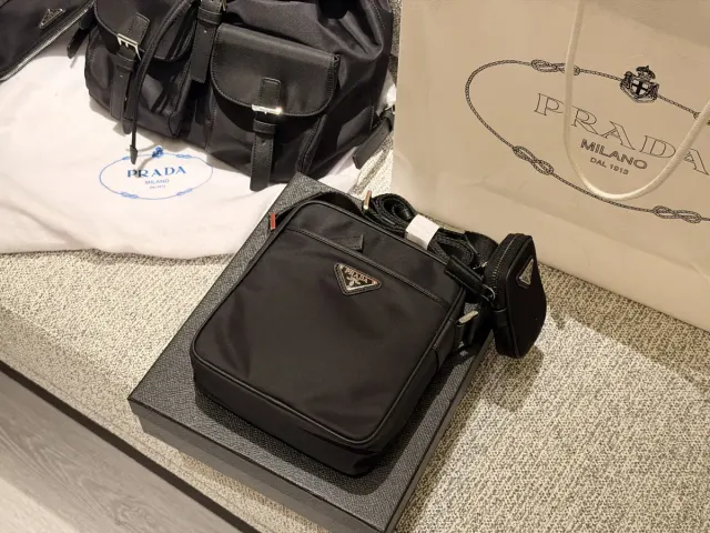 Prada Messenger Bag in Leather — 17 × 20 cm — source photograph 1 of 3