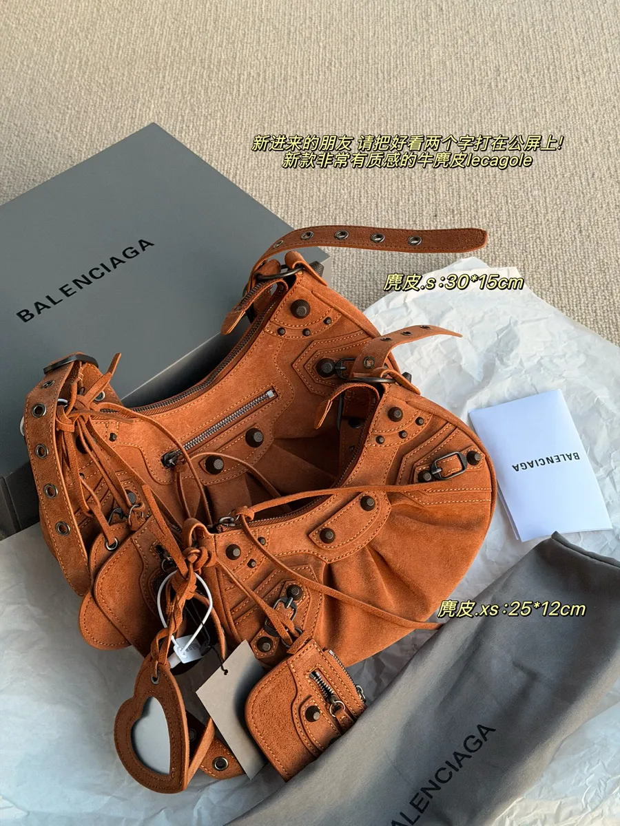 Balenciaga Le Cagole Suede Woven Strap Satchel Bag - 25 × 12 cm Options — source photograph 1 of 3