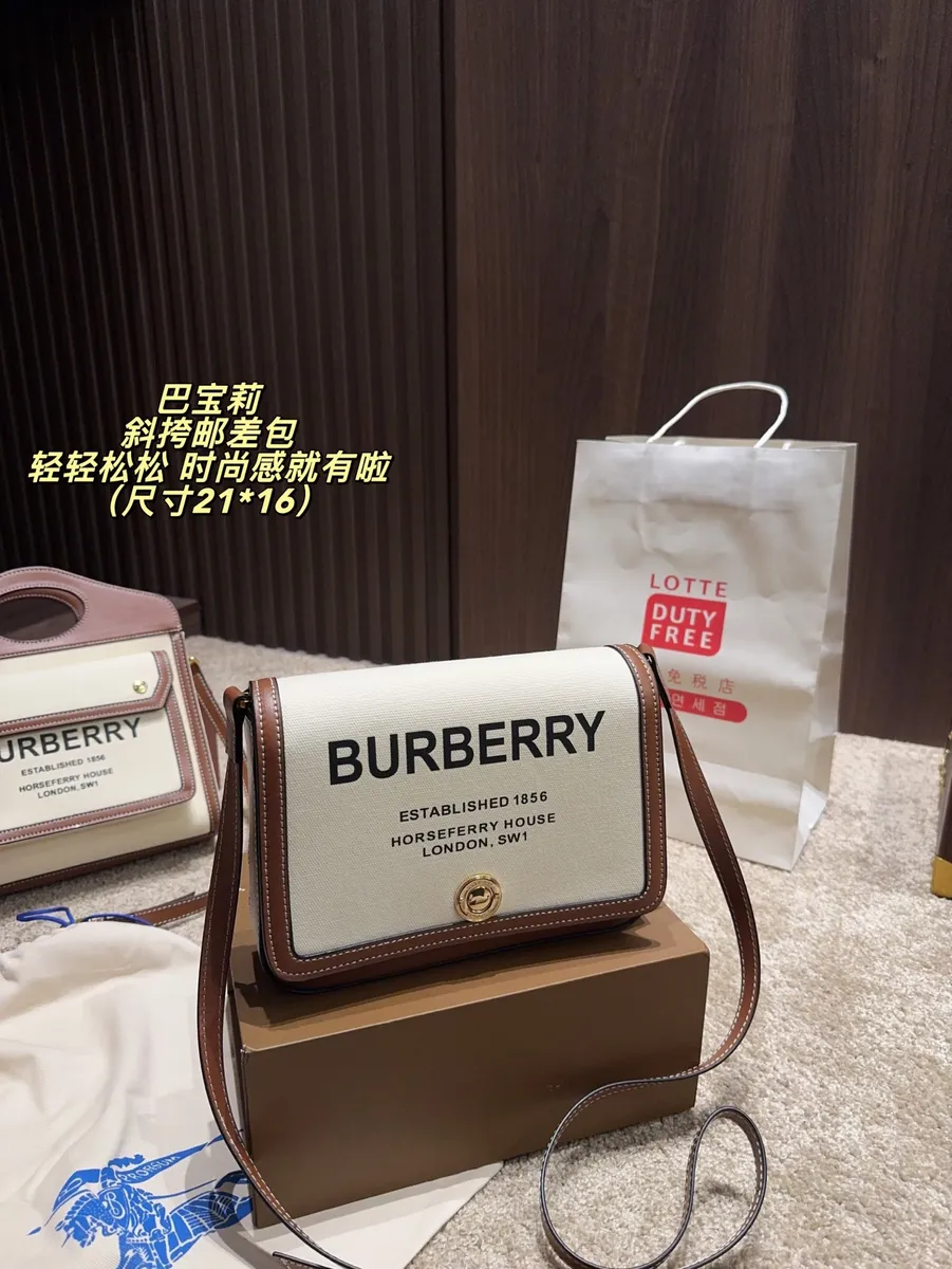 Burberry Canvas Messenger Bag — source photograph 1 of 3