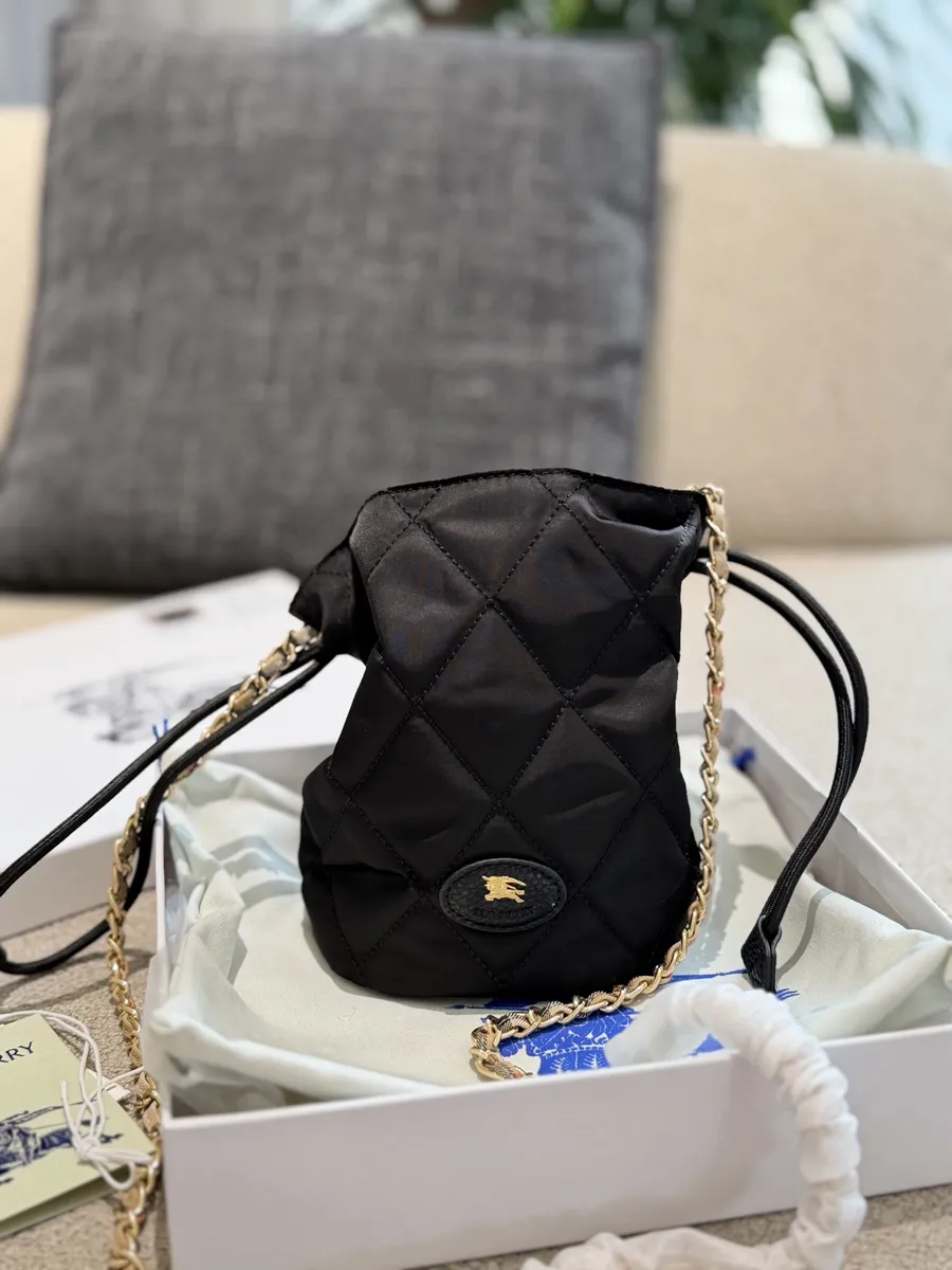 Burberry Check Bucket Bag — source photograph 1 of 3