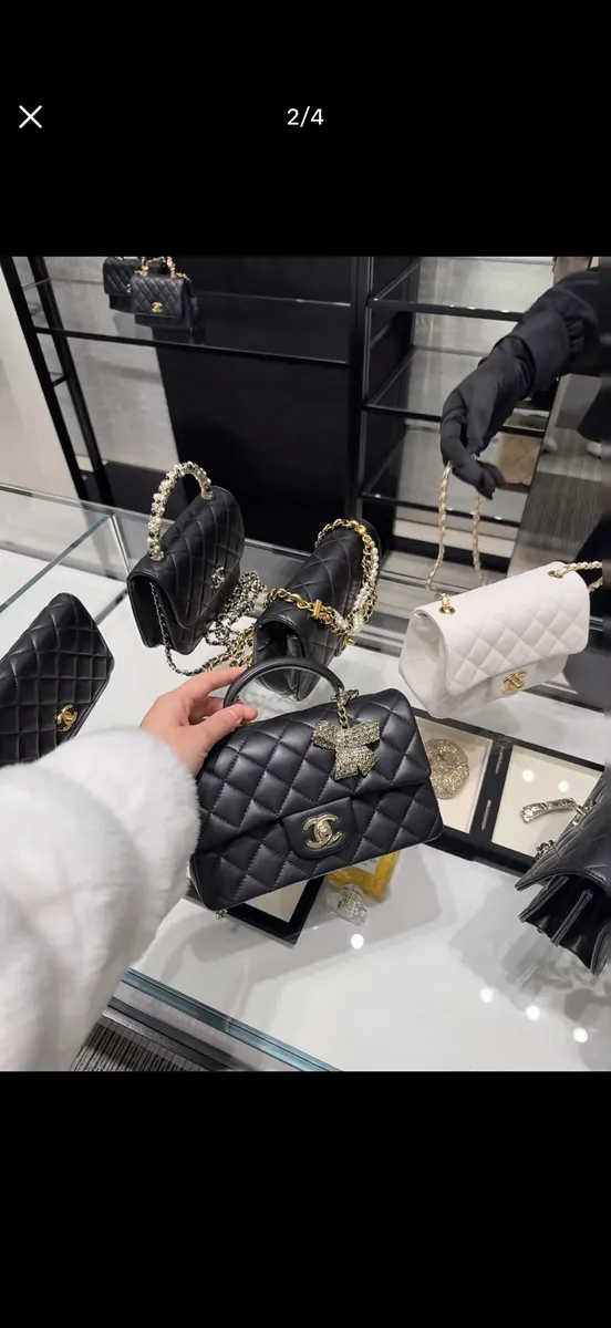 Chanel Classic Flap Bow Mini Bag — source photograph 1 of 3