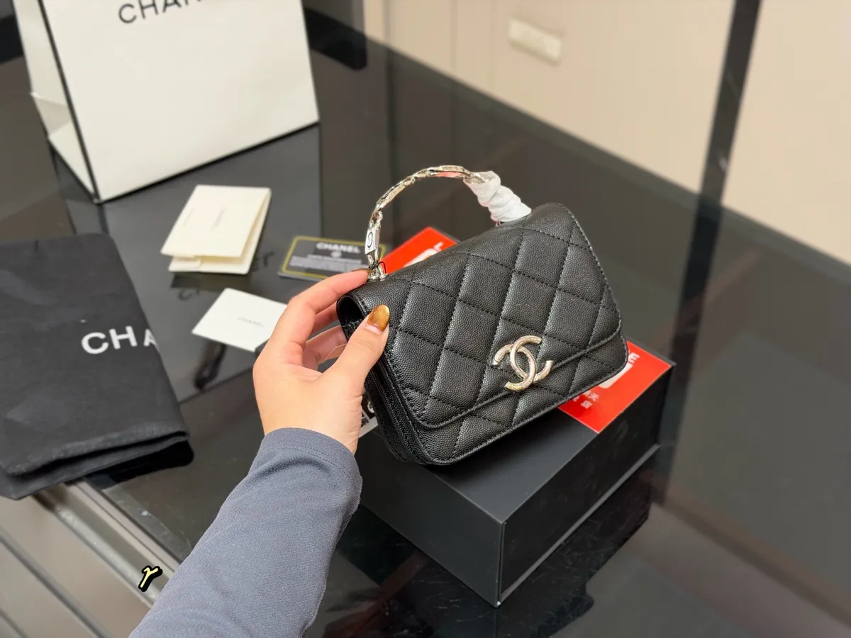 Chanel Coco Openwork Handbag - 15 × 11 cm — source photograph 1 of 3