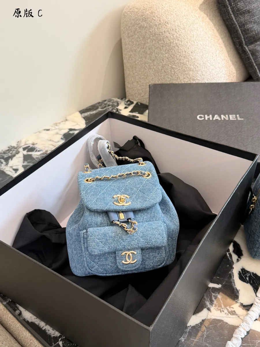 Chanel Denim Chain Backpack — source photograph 1 of 3