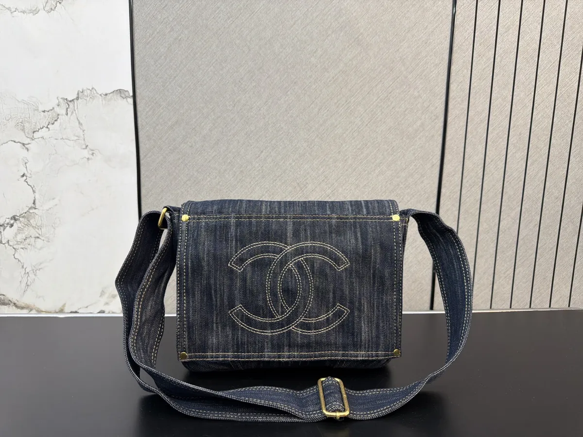 Chanel Denim Flap Messenger Bag - 29 × 25 cm — source photograph 1 of 3