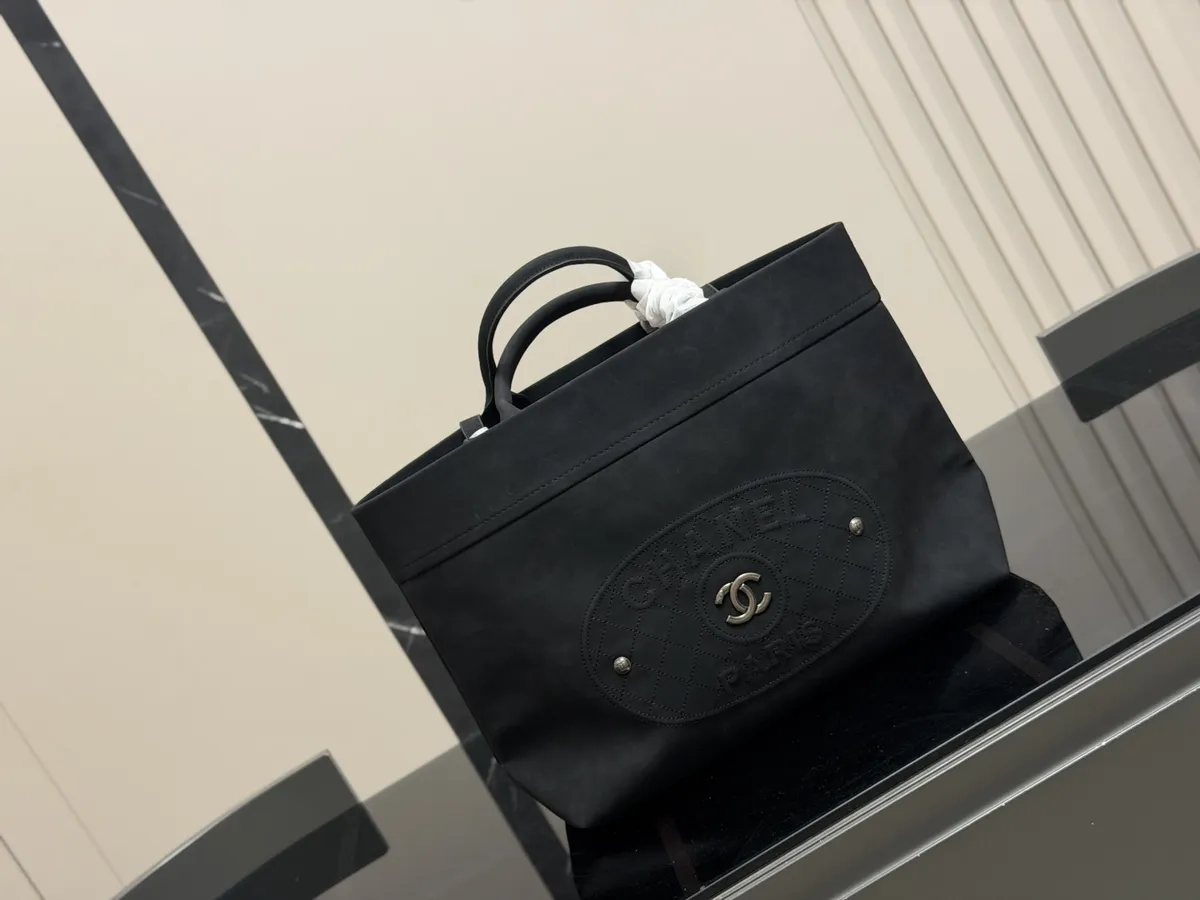Chanel Denim Handbag - 35 × 23 cm — source photograph 1 of 3
