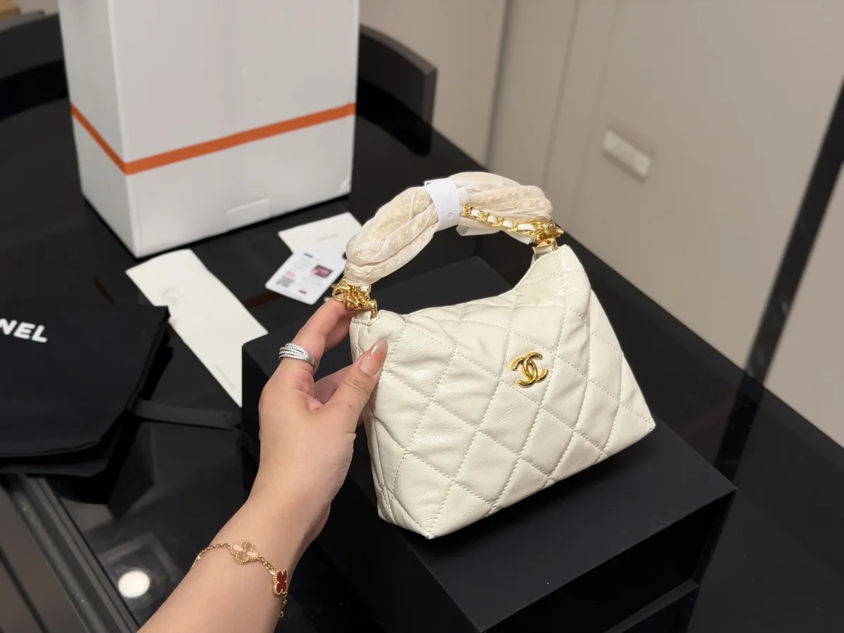 Chanel Gabrielle Shoulder Bag - 18 × 12 cm — source photograph 1 of 3