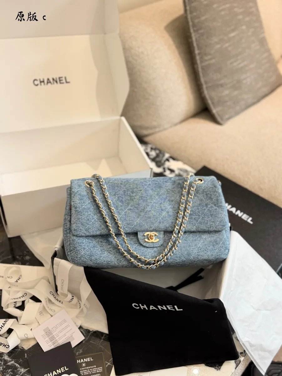 Chanel Maxi Denim Quilted Shoulder Bag - 30 cm — source photograph 1 of 3