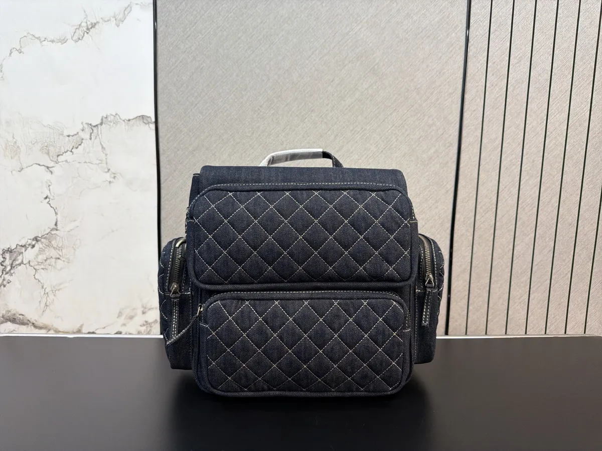 Chanel Quilted Embroidered Backpack - 30 × 32 cm — source photograph 1 of 3