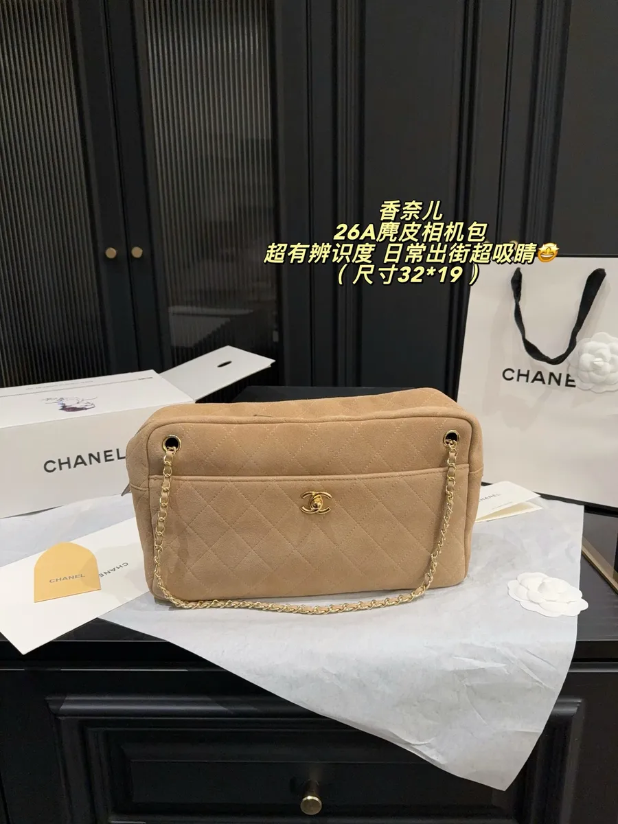 Chanel Suede Quilted Camera Bag — source photograph 1 of 3