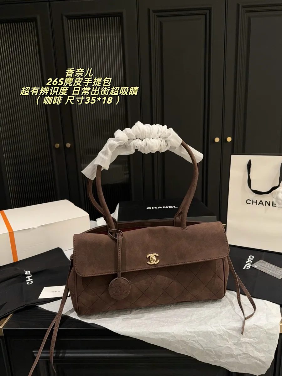 Chanel Suede Quilted Top Handle Bag — source photograph 1 of 3