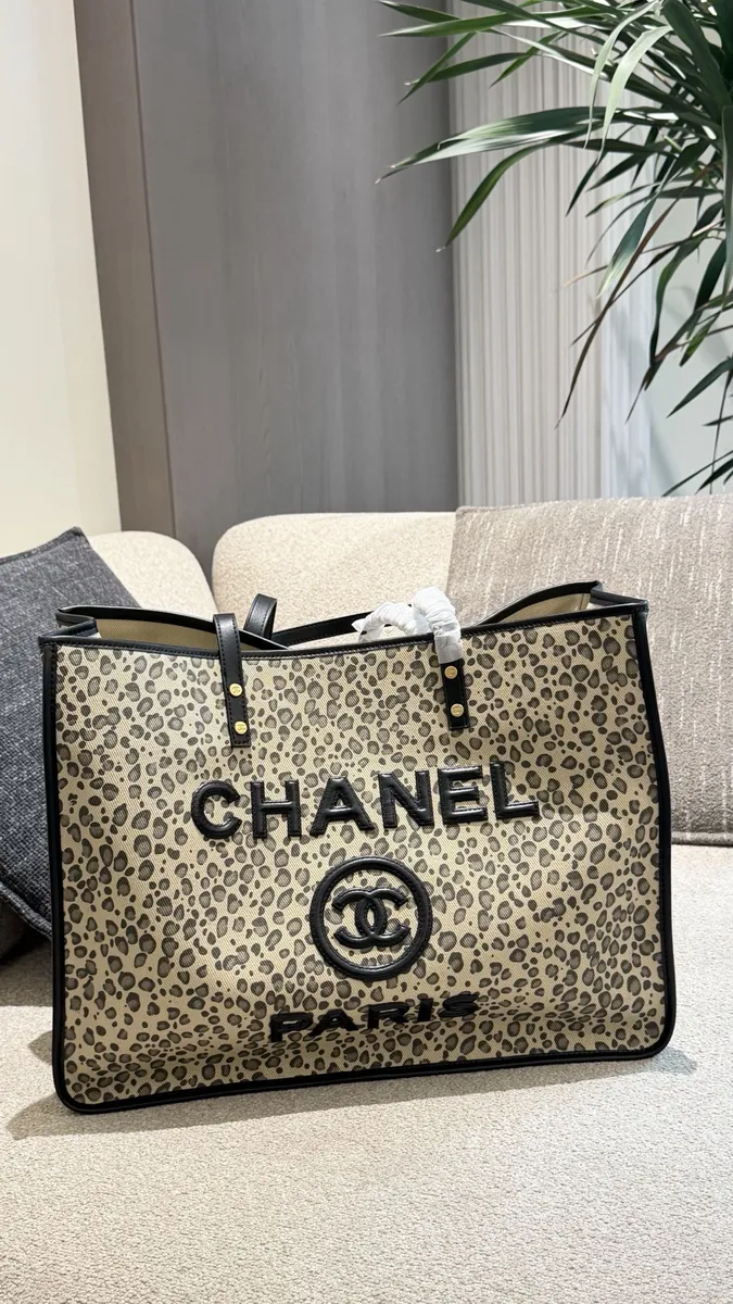 Chanel Woven Canvas Tote Bag - 42 cm — source photograph 1 of 3